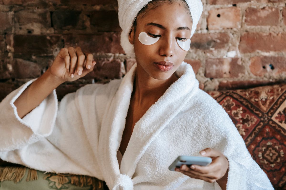 Woman with damp hair wrapped in a towel