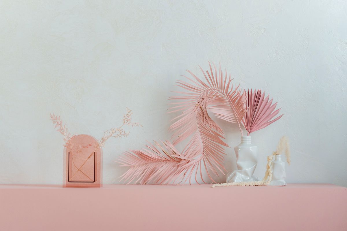 Pink cream blush swatches on a makeup surface
